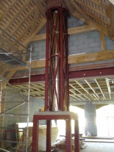 Steel frame installation with flue for bathstone fireplace