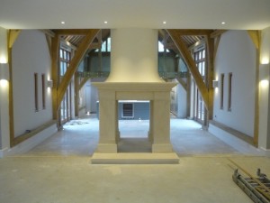 Barn conversion bathstone fireplace