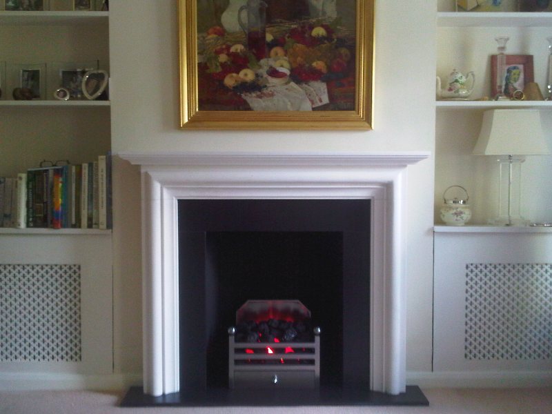 Limestone fireplace surround by Chesneys in London property