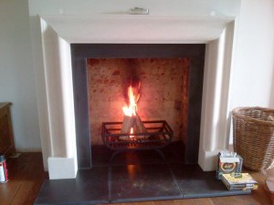 Bolection limestone fireplace with Morris basket from Chesney's