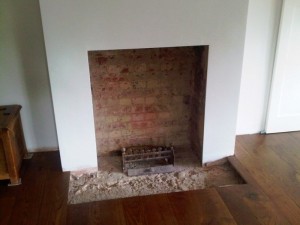 Before Bolection limestone fireplace with Morris basket from Chesney's installation