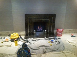 Granite Art Deco Fireplace: Hall fireplace with gas fire
