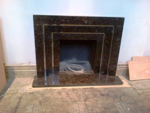 Granite Art Deco Fireplace: trims installed