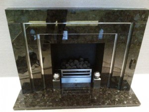 Stunning Granite Fireplace: Landing fireplace completed