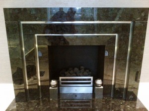 Stunning Granite Fireplace: Landing fireplace in granite