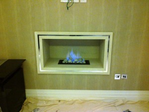 Limestone Hole in the Wall Fireplace: Study fireplace