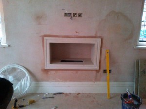 Limestone Hole in the Wall Fireplace: Study fireplace nearing completion
