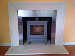 Metro fireplace and Shoreditch Stove by Chesneys with steel slips