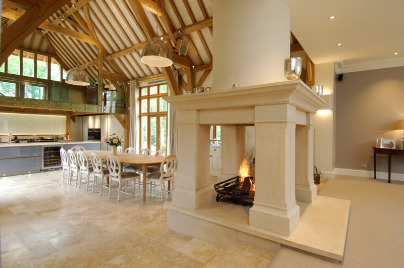 Bathstone four sided fireplace in barn conversion