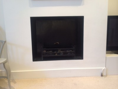 Before the installation of Burlington mantel and ivory beaumont stove