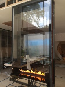 suspended fireplace with glass panels in London