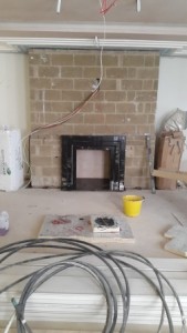 black marble fireplace installation 